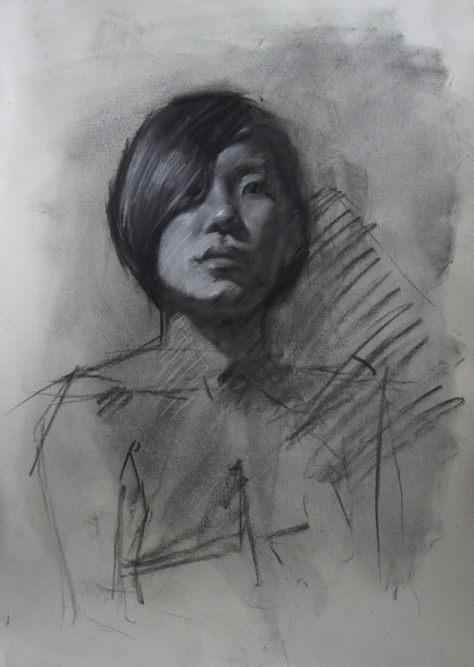 portrait of woman with short hair charcoal on paper