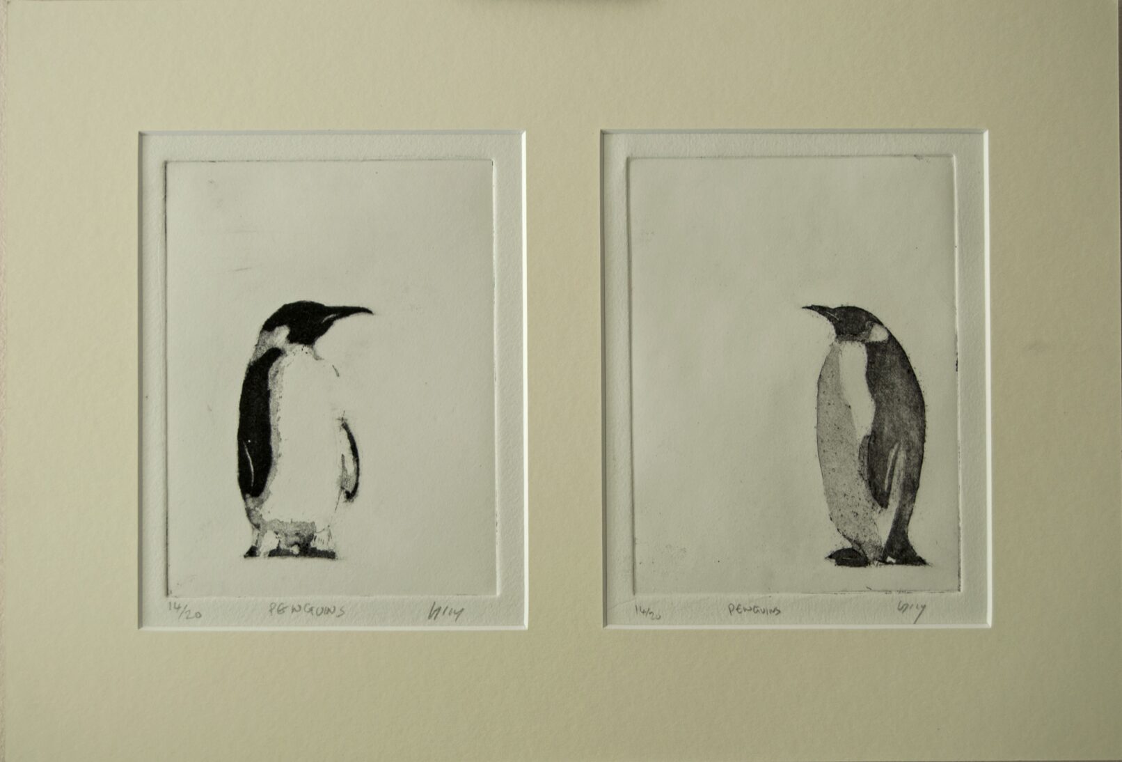 Two penguins facing each other, zinc plate etching