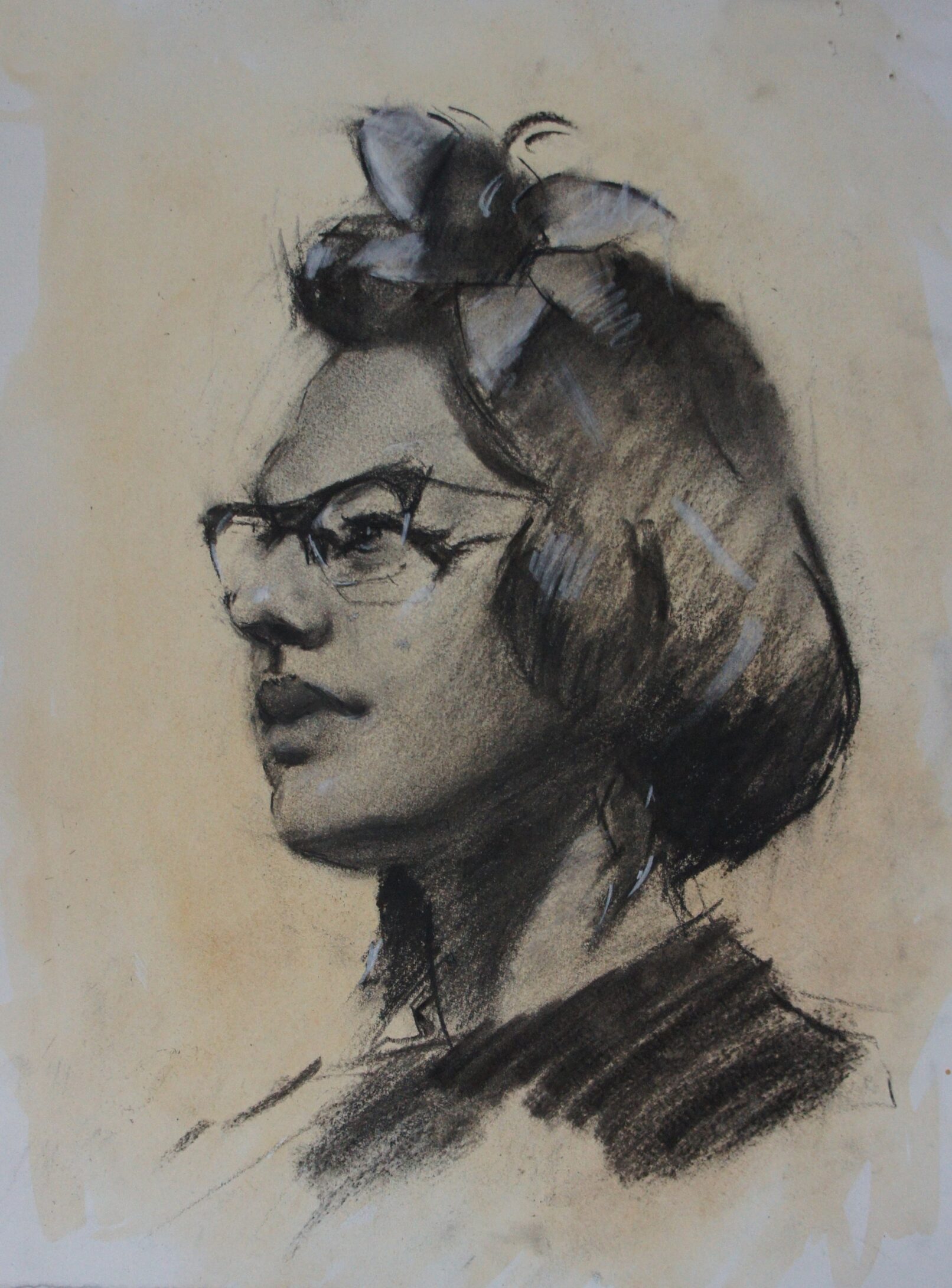 woman turned 3/4 charcoal on paper